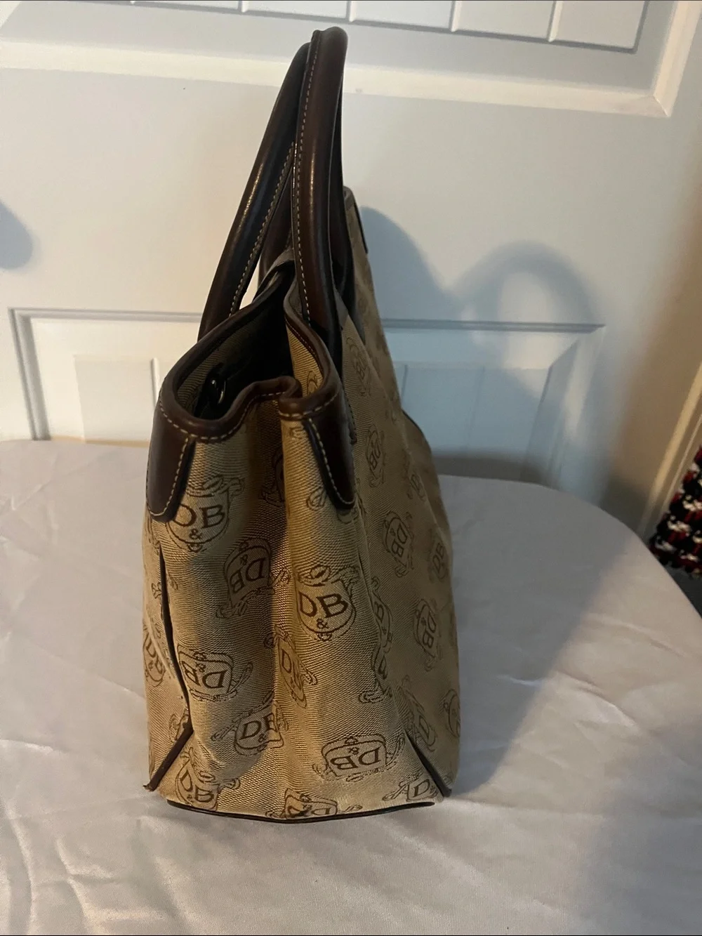 Dooney & Bourke over leather timeless
